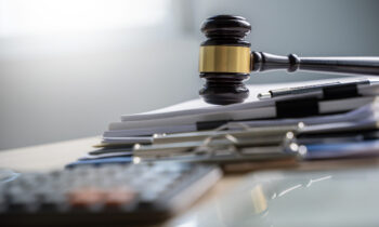 Judge and documents on office desk Legislation